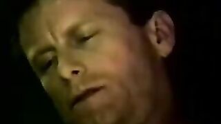 Two straight working men put condoms on