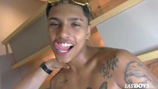 Slim tattooed boy gets a handjob to his big dick