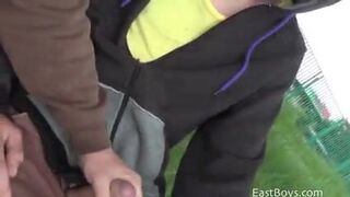 Amateur European gets handjob in public park
