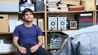 Young white guy enjoys a BBC dick in a security room