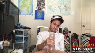 Tattooed Latino twink tugging and wanking his big fat cock