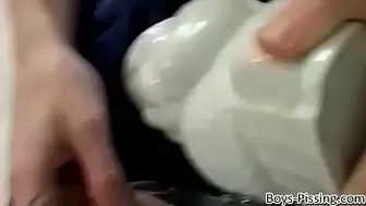Young amateurs pee while masturbating