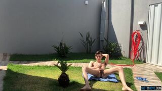 Adorable twink Henry Evans cums while masturbating outdoors