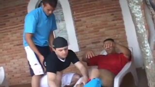 Bottom enduring fucking by two huge cocks