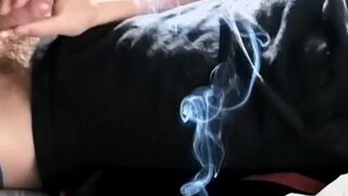 Naughty amateur Jony smokes while masturbating and cumming