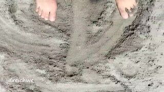 playing with my feet on the beach