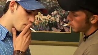 Christian Taylor and Kenny Crusoe smoke cigars during BJ