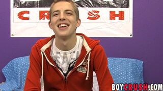 Smiling young homo jerks off and shoots his load out