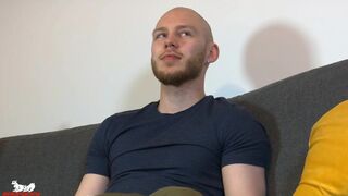 Orson spits on his cock and begins stroking it slowly