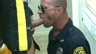 Fireman fucks gay police officer's ass then cums on his abs