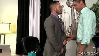 Latino stud takes a huge cock in the office