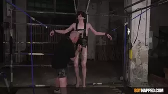 Bound twink Jake Hunter cock stroked by daddy Sebastian Kane