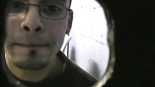 Thin gay white guy sucking off black cocks at a gloryhole