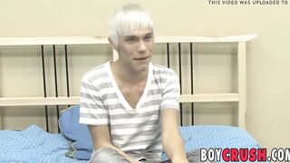 Young gay man playing with his dick during an interview